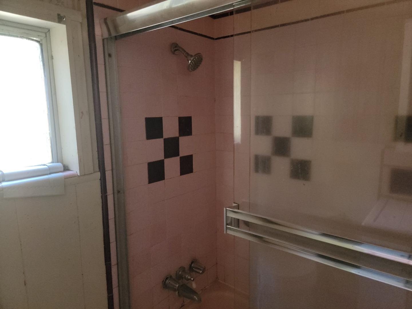 159 Strawberry Road Watsonville, CA 95076 - Photo 76 of 109 a bathroom with a shower and a sink