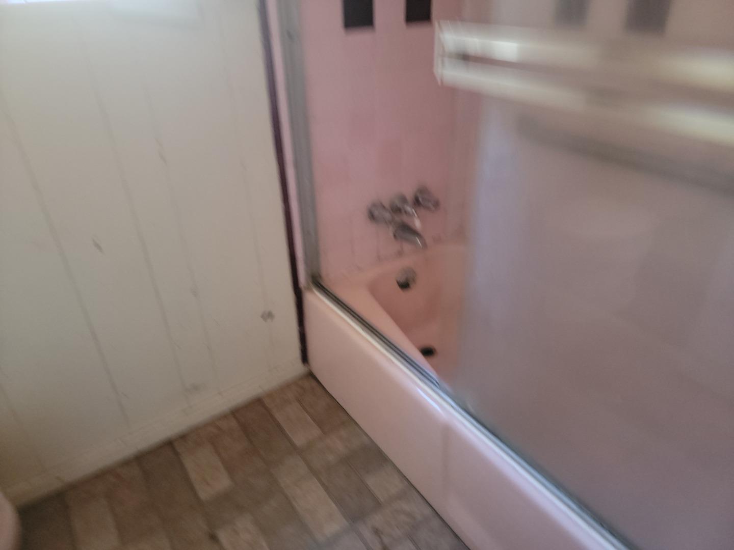 159 Strawberry Road Watsonville, CA 95076 - Photo 78 of 109 a bathroom with a bathtub and shower