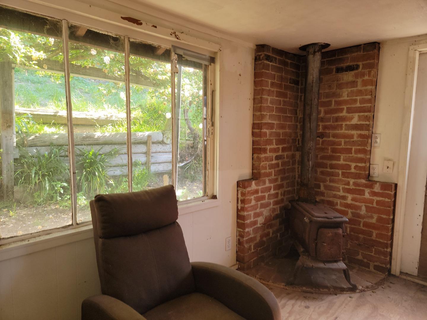 159 Strawberry Road Watsonville, CA 95076 - Photo 81 of 109 a living room with furniture and a window