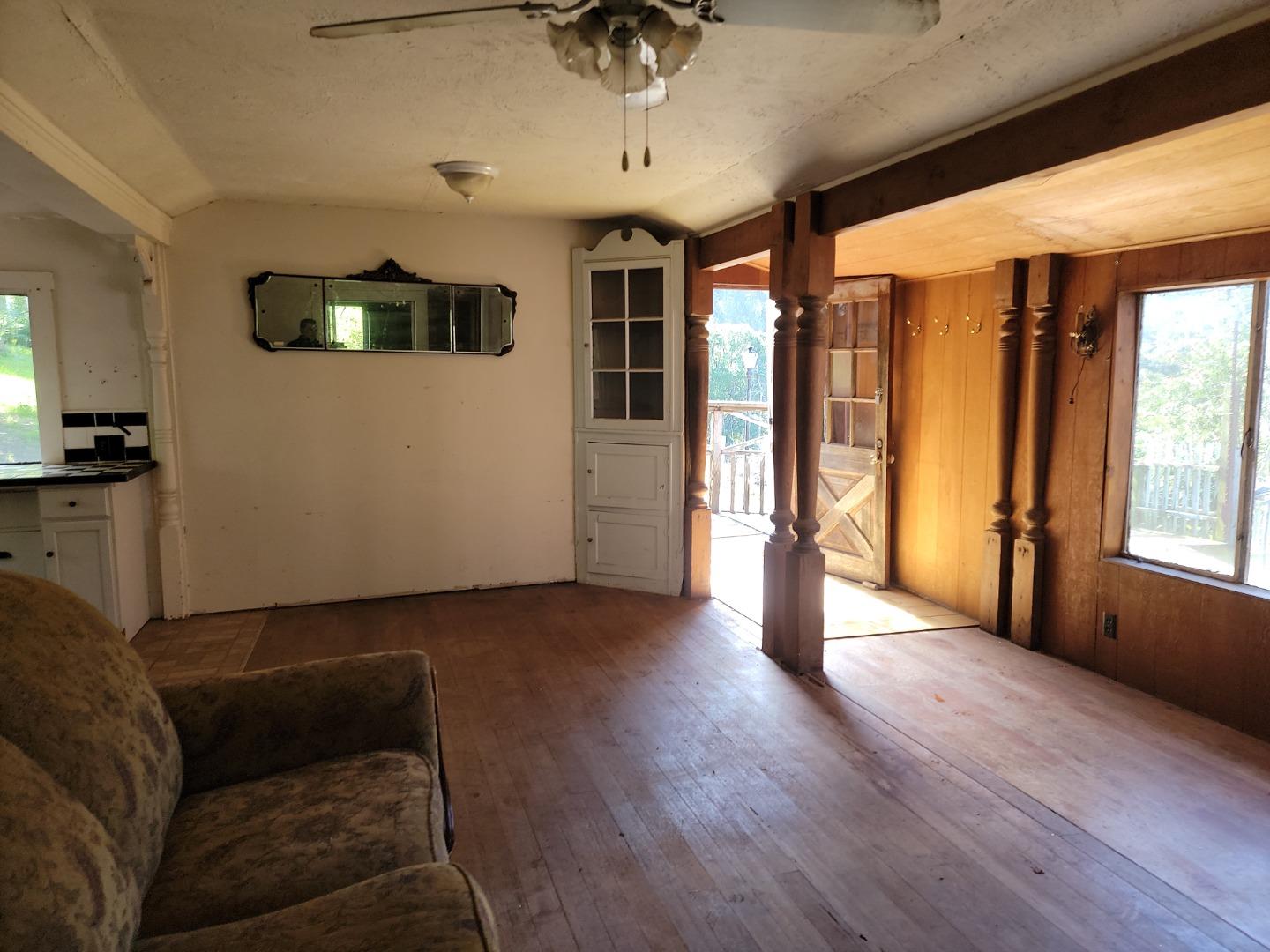 159 Strawberry Road Watsonville, CA 95076 - Photo 82 of 109 a living room with furniture and a flat screen tv