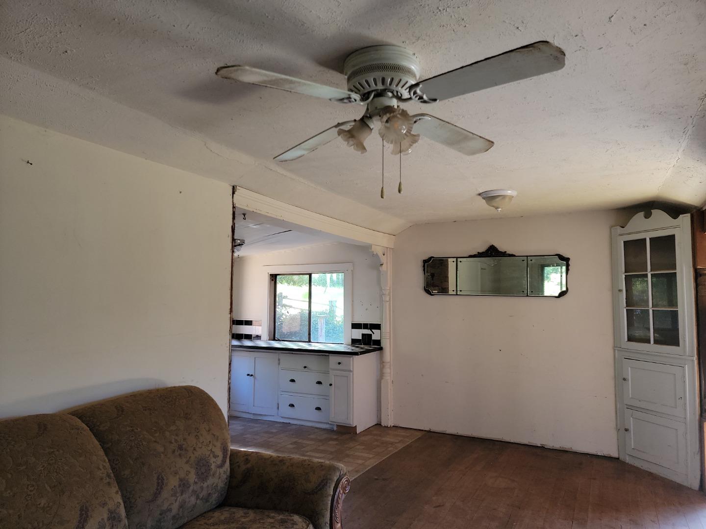 159 Strawberry Road Watsonville, CA 95076 - Photo 85 of 109 a living room with furniture and a flat screen tv