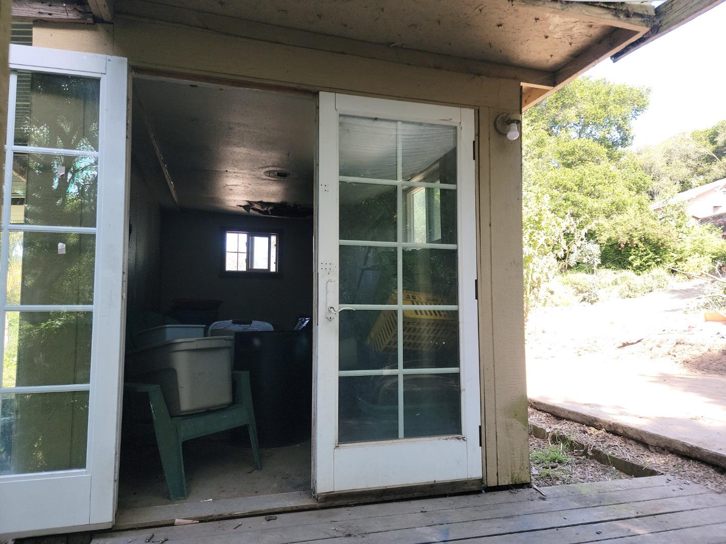159 Strawberry Road Watsonville, CA 95076 - Photo 94 of 109 a view of empty room with wooden floor and fan