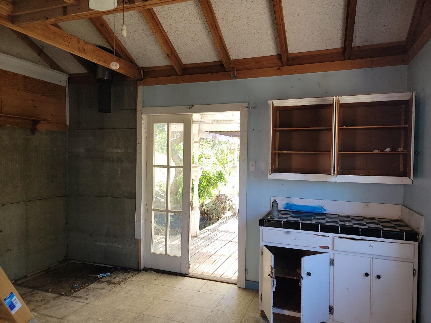 159 Strawberry Road Watsonville, CA 95076 - Photo 99 of 109 a kitchen with a stove and a refrigerator