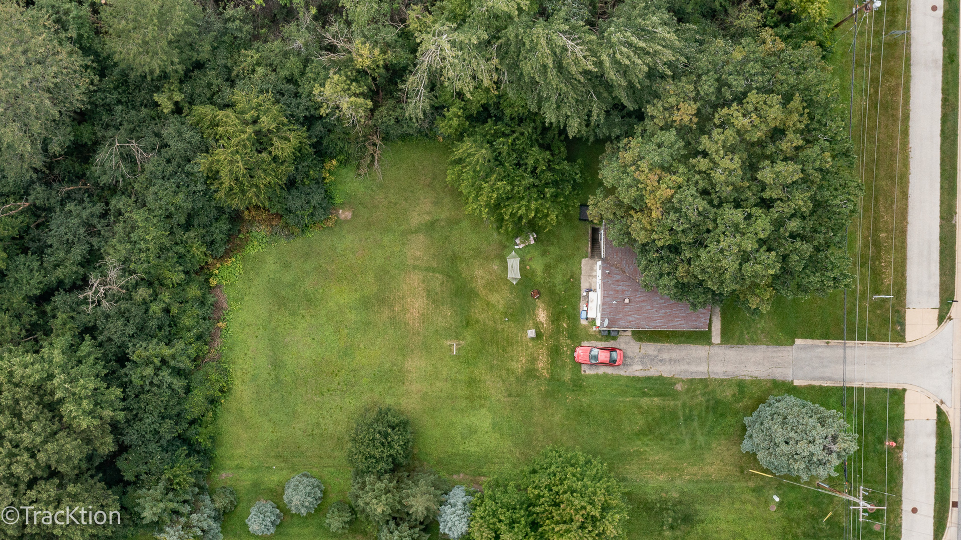 2505 75th Street Darien, IL 60561 - Photo 2 of 4 an aerial view of green landscape with trees