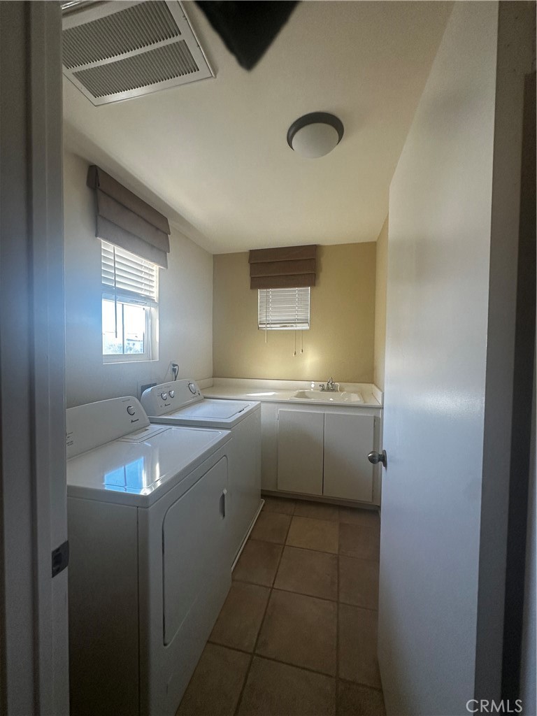 4175 Windspring Street Corona, CA 92883 - Photo 13 of 18 Upstairs Laundry room
