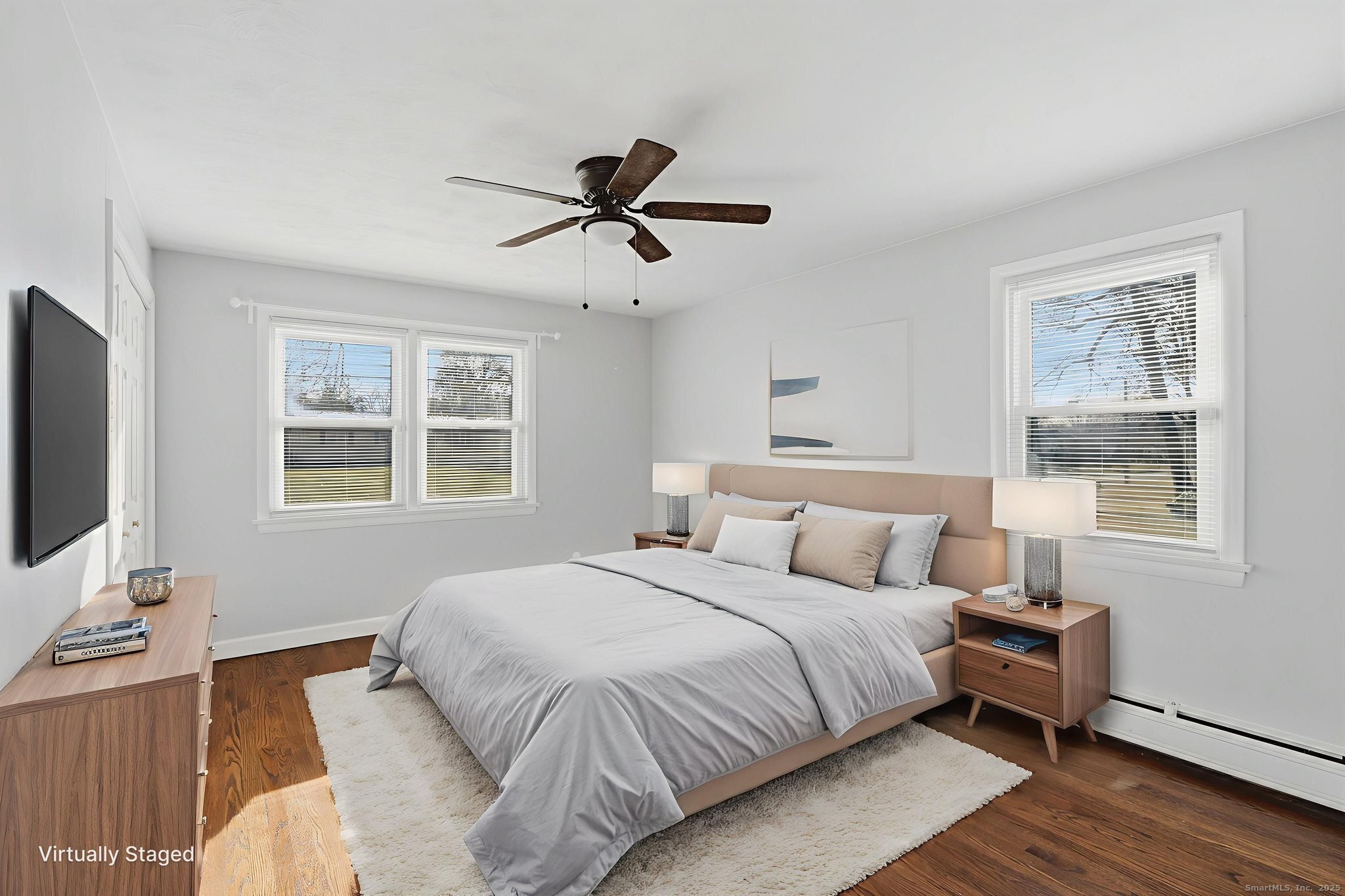 269 Great Swamp Road Glastonbury, CT 06033 - Photo 17 of 31 a bedroom with a bed and a flat screen tv