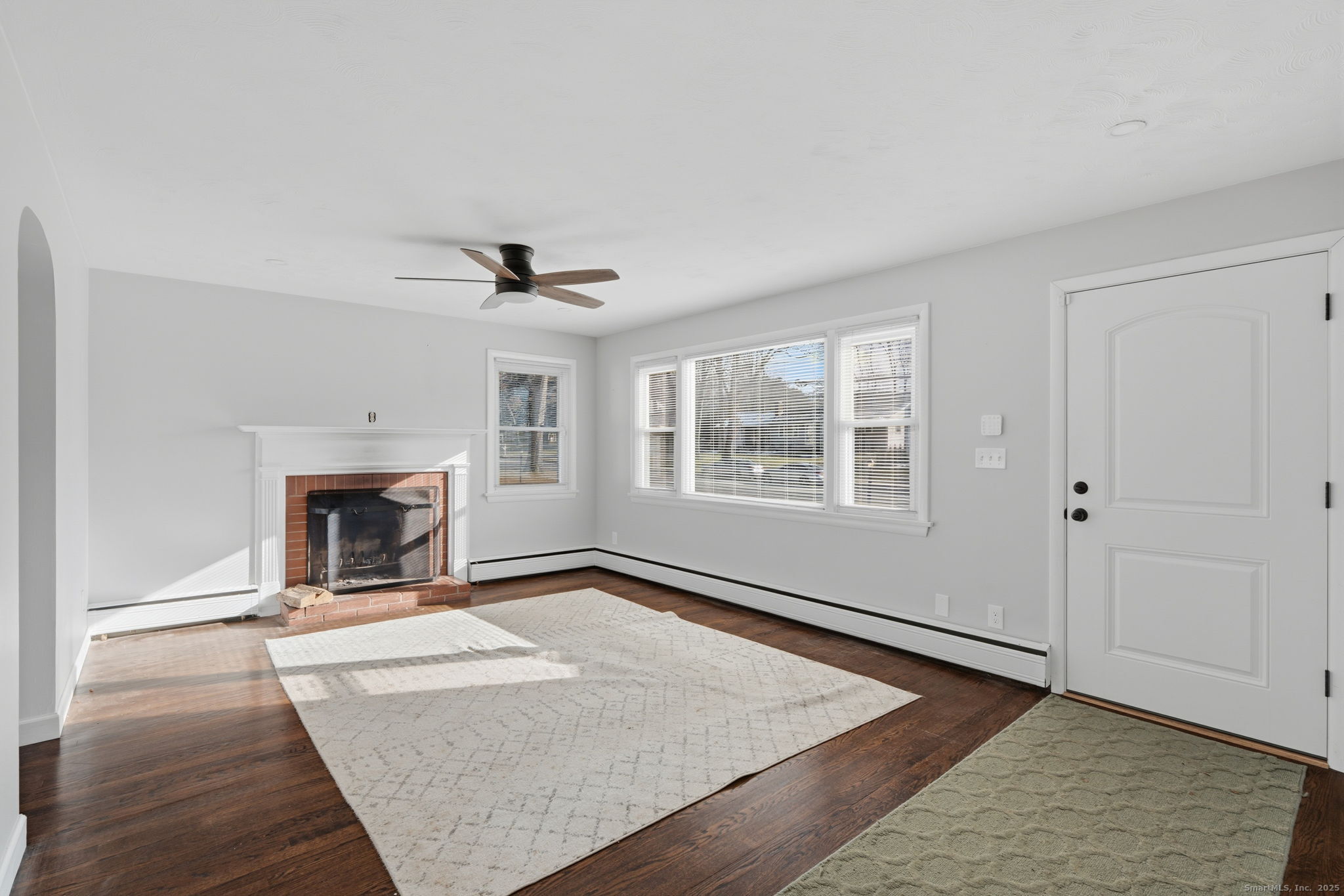 269 Great Swamp Road Glastonbury, CT 06033 - Photo 3 of 31 a view of an empty room with window and fire place