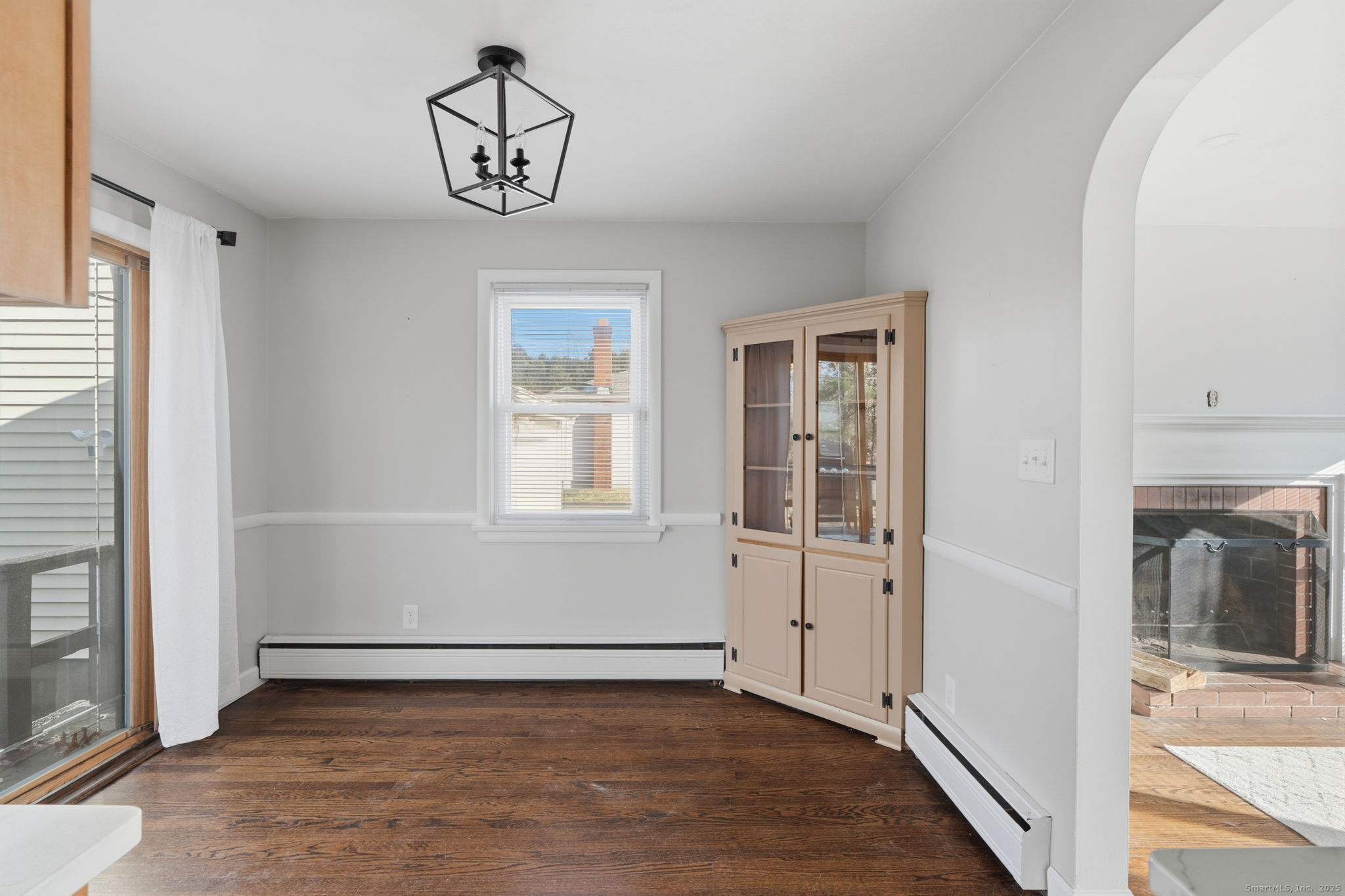 269 Great Swamp Road Glastonbury, CT 06033 - Photo 6 of 31 an empty room with wooden floor and windows