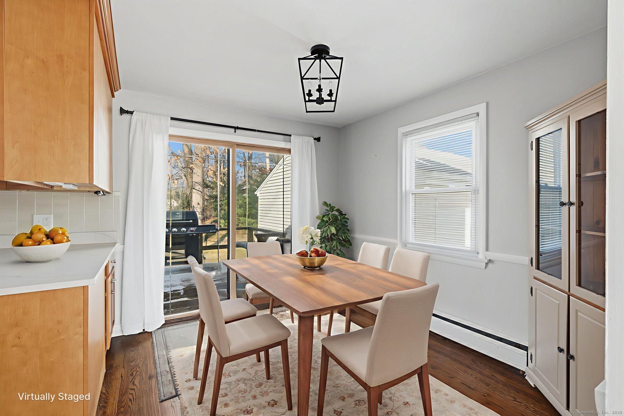 269 Great Swamp Road Glastonbury, CT 06033 - Photo 8 of 31 a view of a dining room with furniture window and outside view