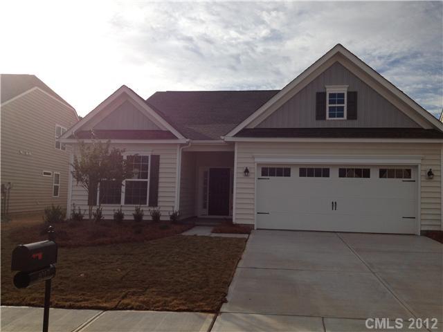 4017 Perth Road, Unit 400 Indian Land, SC 29707 - Photo 1 of 11 a front view of a house with a yard