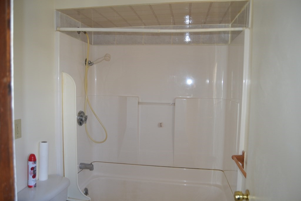 8 Cedar Court Lowell, MA 01852 - Photo 17 of 28 a bathroom with a shower