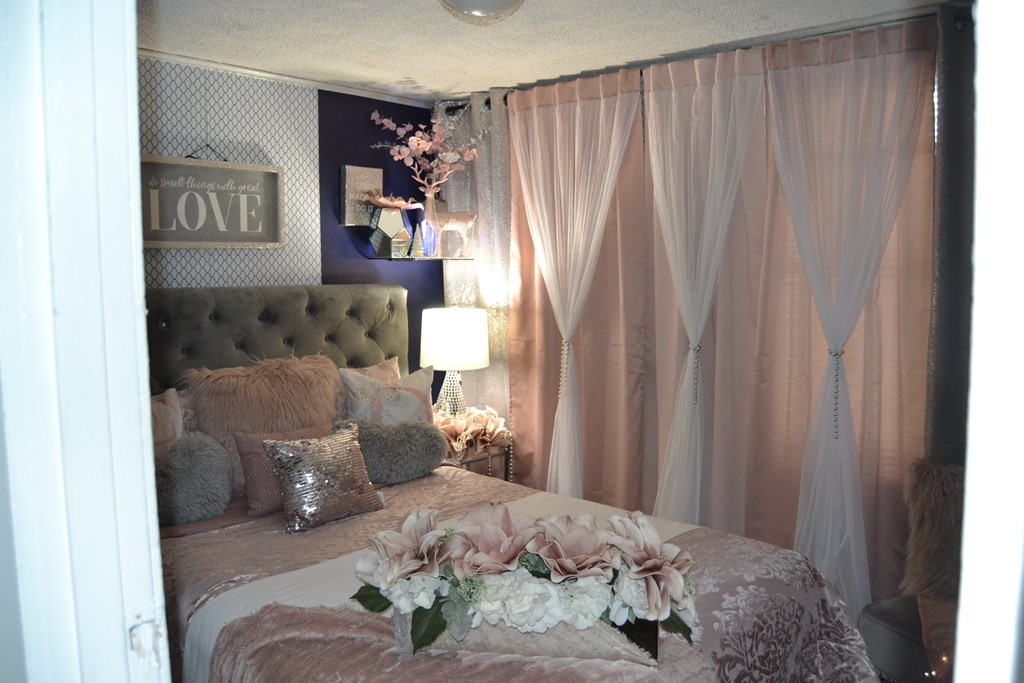 8 Cedar Court Lowell, MA 01852 - Photo 22 of 28 a bedroom with a bed and a window