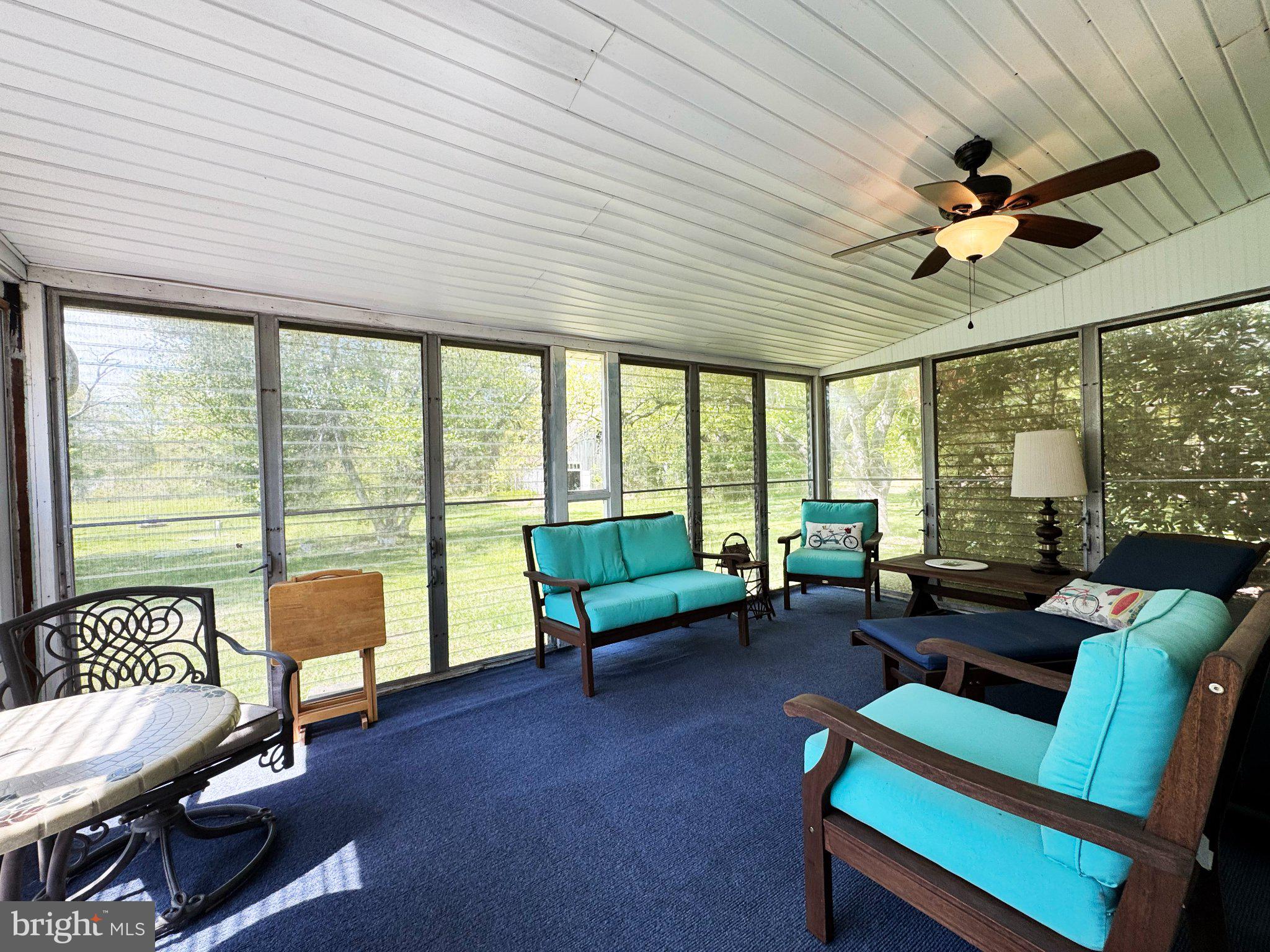4156 Campbell Road Pennsburg, PA 18073 - Photo 13 of 27 Serene sunlit screened porch retreat.
