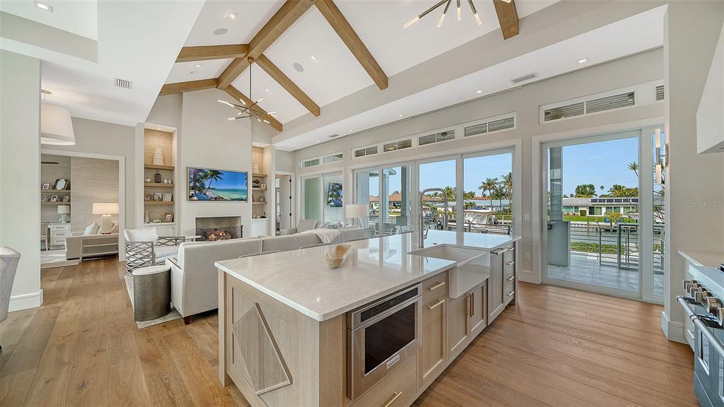 681 Old Compass Road Longboat Key, FL 34228 - Photo 13 of 67 a large white kitchen with a large window