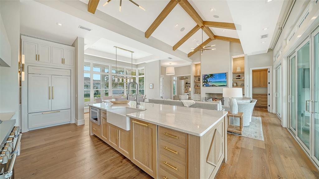 681 Old Compass Road Longboat Key, FL 34228 - Photo 15 of 67 a large white kitchen with a large window