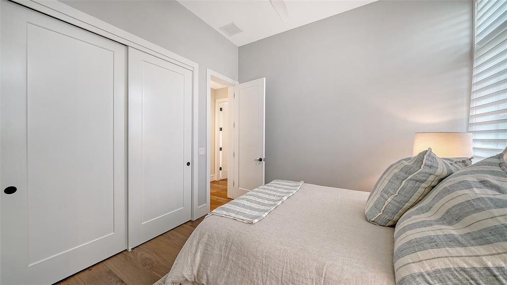 681 Old Compass Road Longboat Key, FL 34228 - Photo 27 of 67 a bedroom with a bed and a window