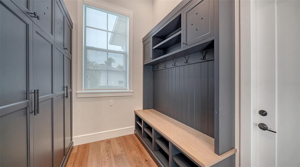 681 Old Compass Road Longboat Key, FL 34228 - Photo 42 of 67 a kitchen with stainless steel appliances a refrigerator and a window