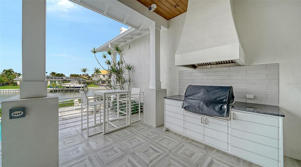 681 Old Compass Road Longboat Key, FL 34228 - Photo 44 of 67 a bathroom with a sink and a mirror