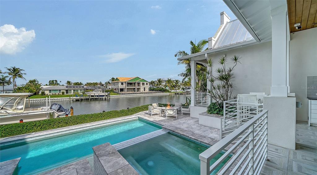 681 Old Compass Road Longboat Key, FL 34228 - Photo 49 of 67 a view of a house with a ocean view