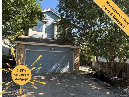 a front view of a house with backyard