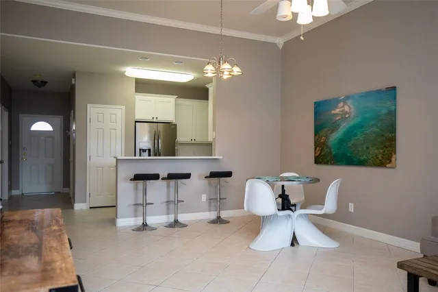 a view of kitchen with workspace and window