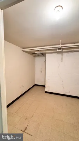 a view of a room with an empty shelf