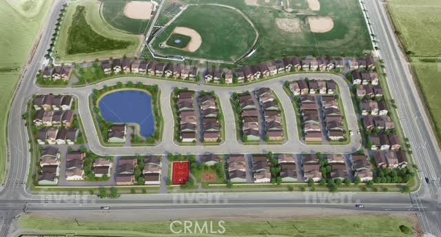 5024 Palisade Avenue Merced, CA 95348 - Photo 12 of 12 an aerial view of a brick building with a swimming pool