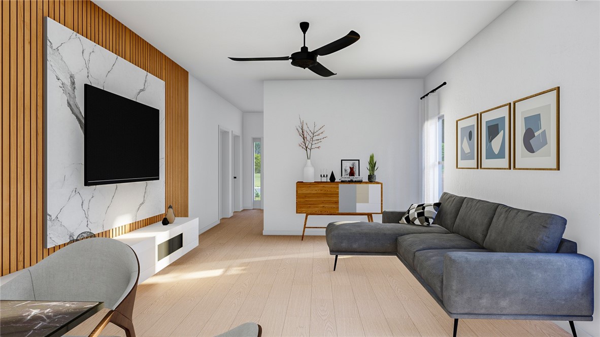 5024 Palisade Avenue Merced, CA 95348 - Photo 2 of 12 a living room with furniture and a flat screen tv