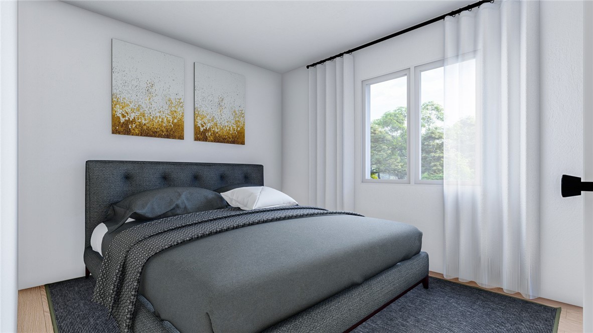 5024 Palisade Avenue Merced, CA 95348 - Photo 5 of 12 a bedroom with a bed and a window