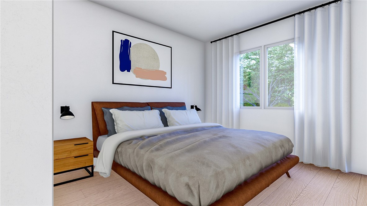 5024 Palisade Avenue Merced, CA 95348 - Photo 6 of 12 a bedroom with a bed and a painting on the wall