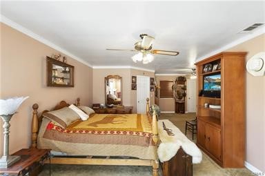 14433 Roy Rogers Ranch Road Oro Grande, CA 92368 - Photo 11 of 64 a bed room with a bed mirror and a window