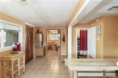 14433 Roy Rogers Ranch Road Oro Grande, CA 92368 - Photo 13 of 64 a living room with furniture and large windows
