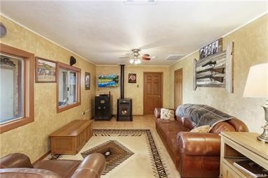 14433 Roy Rogers Ranch Road Oro Grande, CA 92368 - Photo 16 of 64 a living room with furniture and a couch