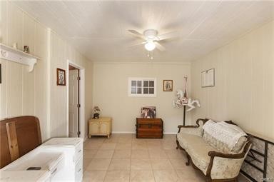 14433 Roy Rogers Ranch Road Oro Grande, CA 92368 - Photo 29 of 64 a living room with furniture and a chandelier