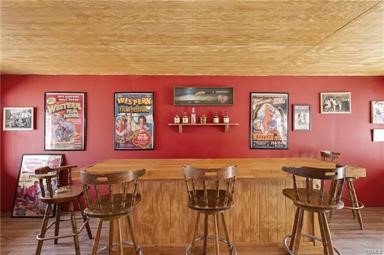 14433 Roy Rogers Ranch Road Oro Grande, CA 92368 - Photo 34 of 64 a view of a room with furniture and wooden floor