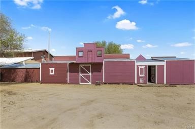 14433 Roy Rogers Ranch Road Oro Grande, CA 92368 - Photo 42 of 64 a view of a house with a yard