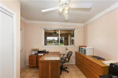 14433 Roy Rogers Ranch Road Oro Grande, CA 92368 - Photo 10 of 64 a view of a workspace with furniture and a window