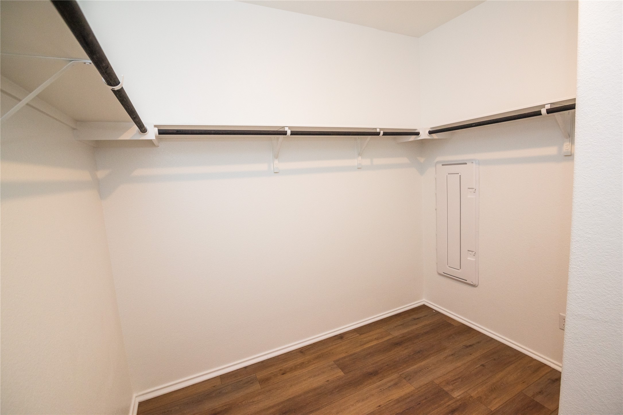 116 The Ugly Way Jarrell, TX 76537 - Photo 14 of 27 a view of walk in closet with empty racks