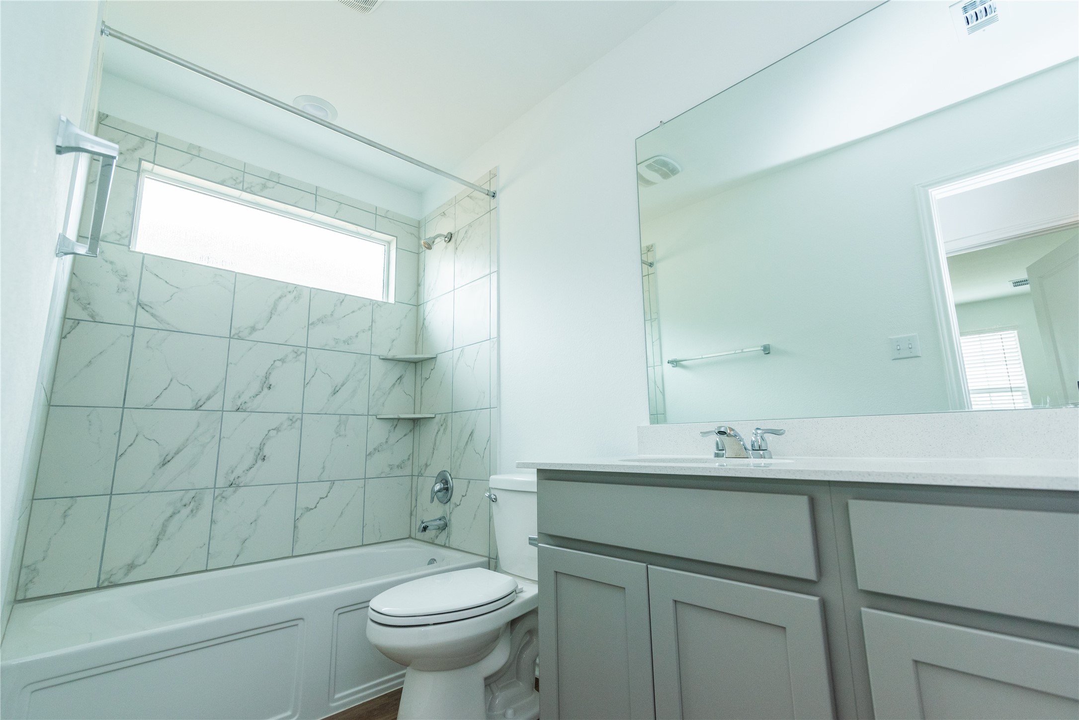 116 The Ugly Way Jarrell, TX 76537 - Photo 17 of 27 a bathroom with a sink toilet and shower