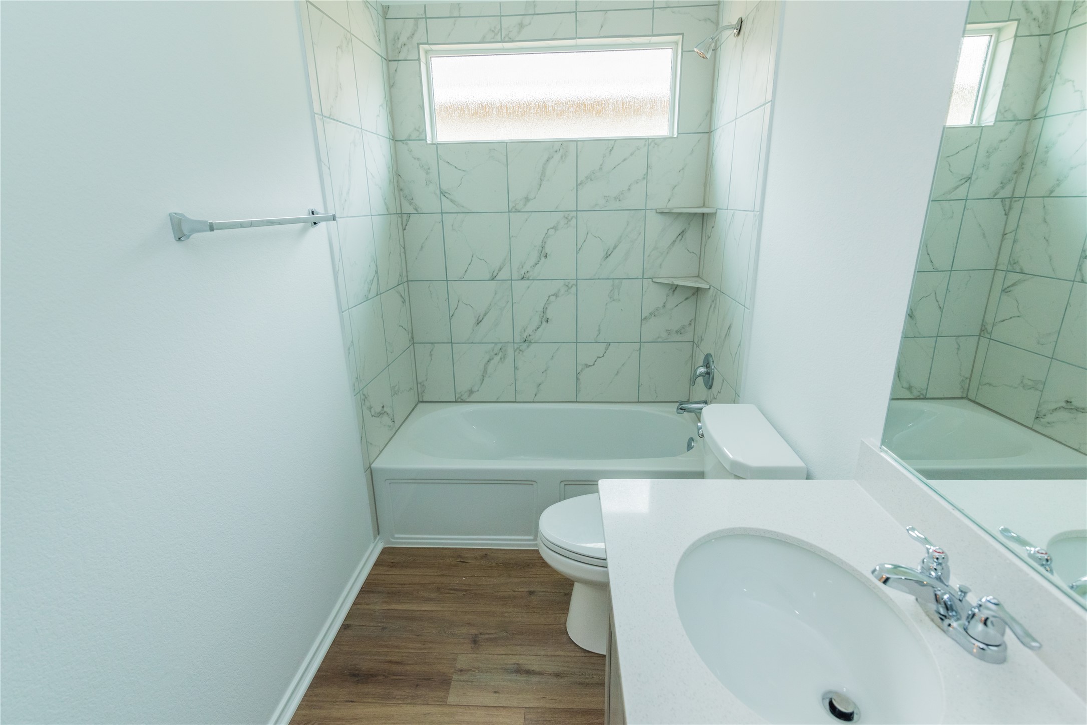 116 The Ugly Way Jarrell, TX 76537 - Photo 21 of 27 a bathroom with a sink a toilet and bathtub