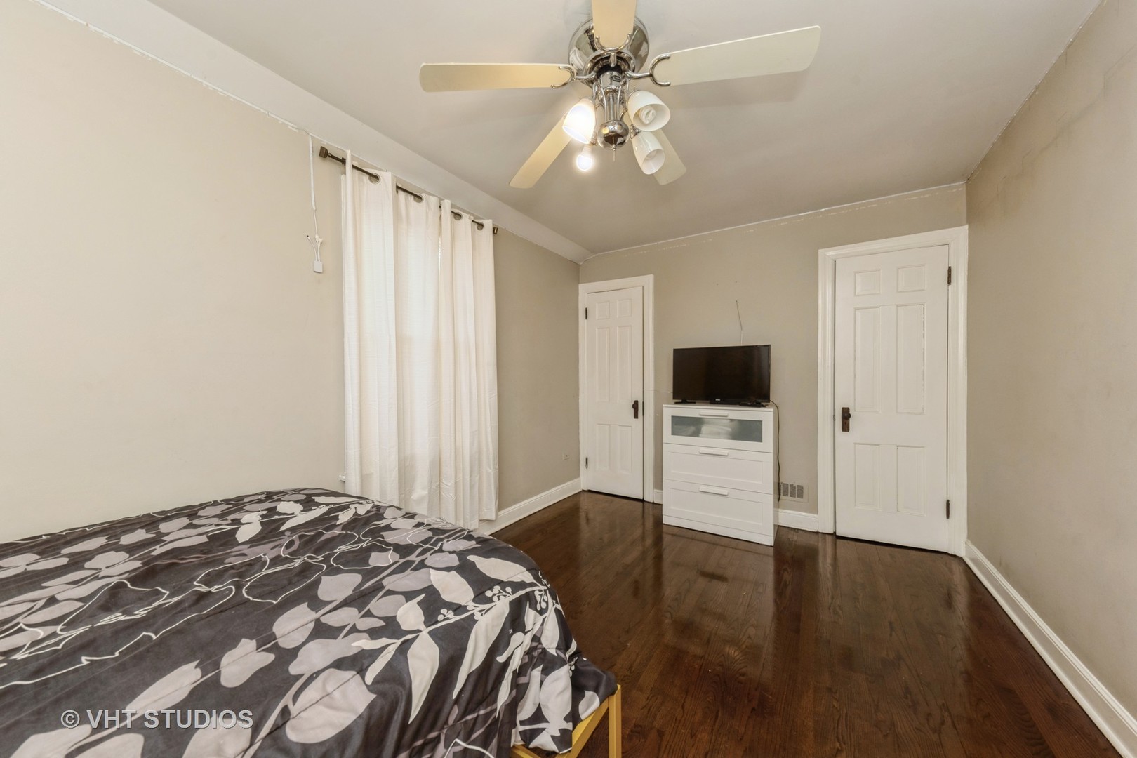 221 Cornwall Drive Crete, IL 60417 - Photo 14 of 26 a bedroom with a bed and a flat screen tv