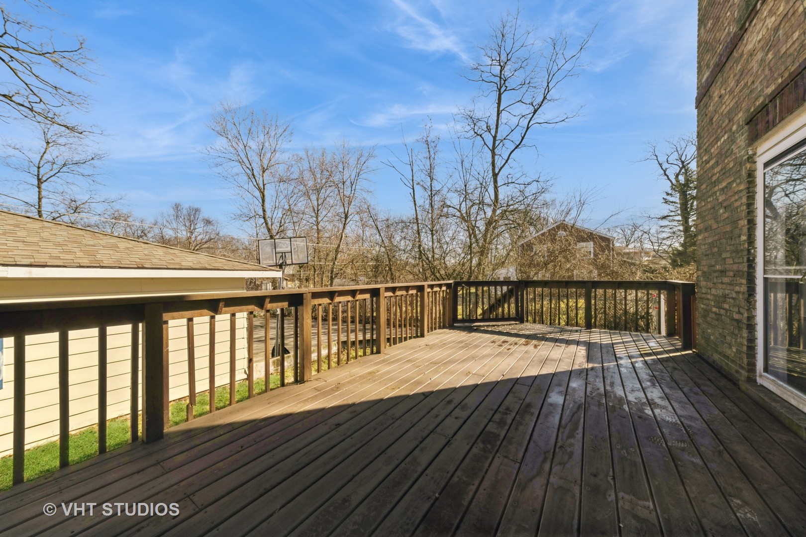 221 Cornwall Drive Crete, IL 60417 - Photo 24 of 26 a view of balcony with wooden floor and fence