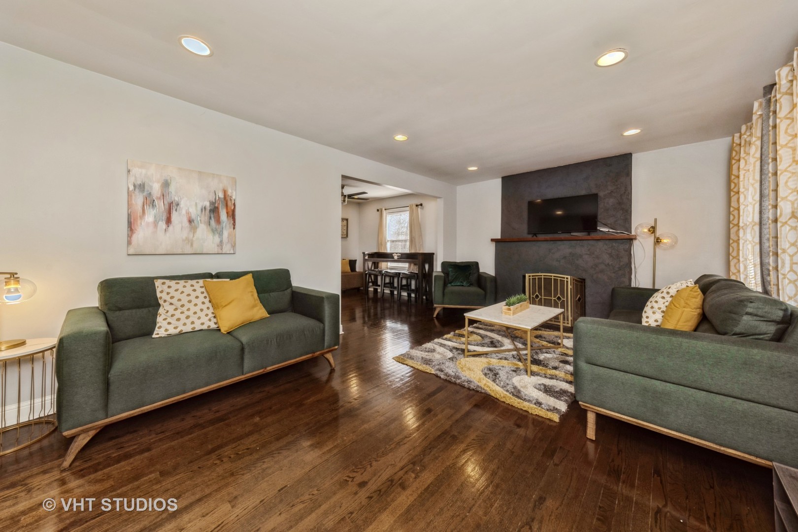 221 Cornwall Drive Crete, IL 60417 - Photo 5 of 26 a living room with furniture flat screen tv and couches