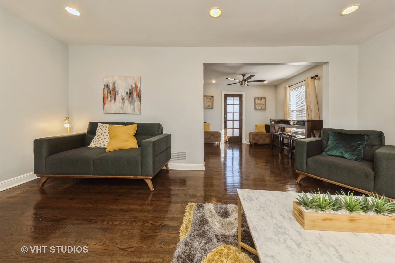 221 Cornwall Drive Crete, IL 60417 - Photo 7 of 26 a living room with furniture and wooden floor