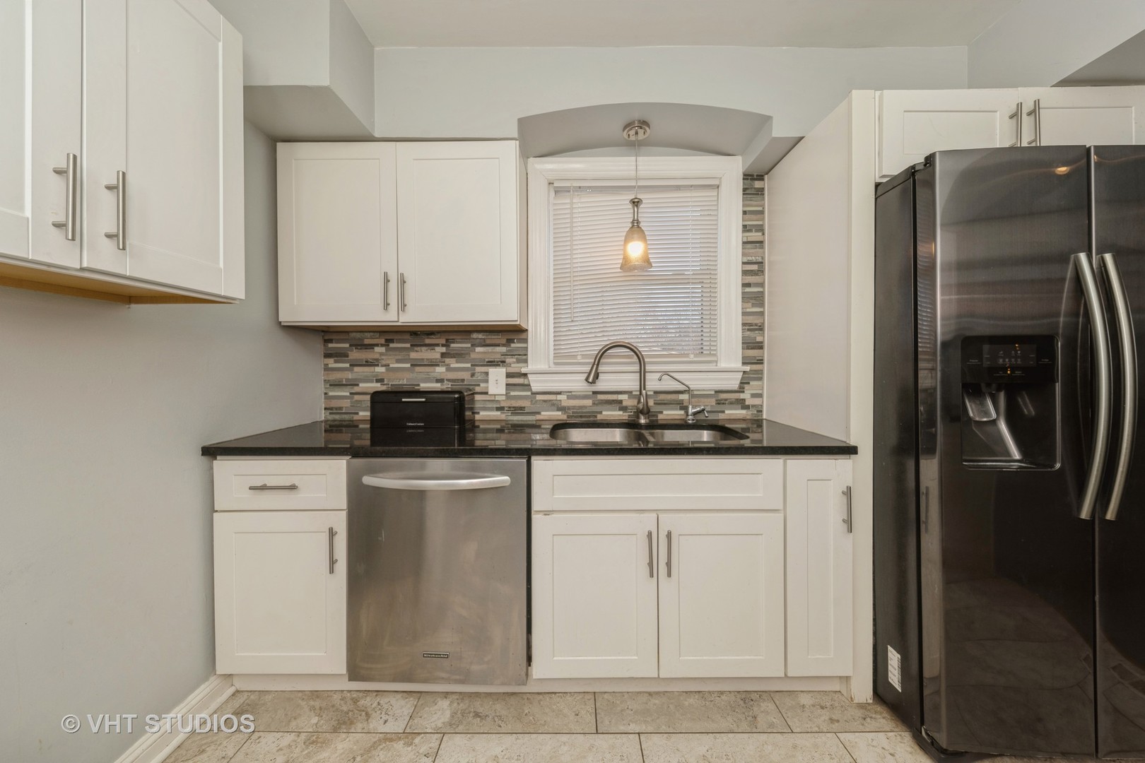221 Cornwall Drive Crete, IL 60417 - Photo 10 of 26 a kitchen with stainless steel appliances granite countertop a refrigerator a stove and a sink