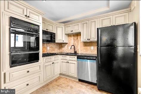 2401 H Street Northwest, Unit 211 Washington, DC 20037 - Photo 2 of 14 a kitchen with stainless steel appliances granite countertop a refrigerator and a stove top oven