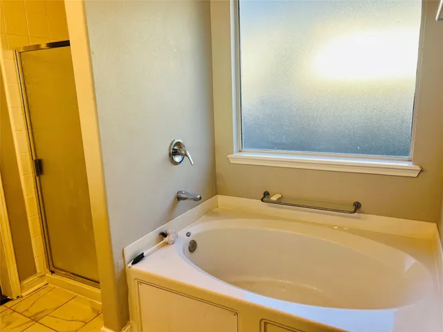 a bathroom with a sink and a bathtub