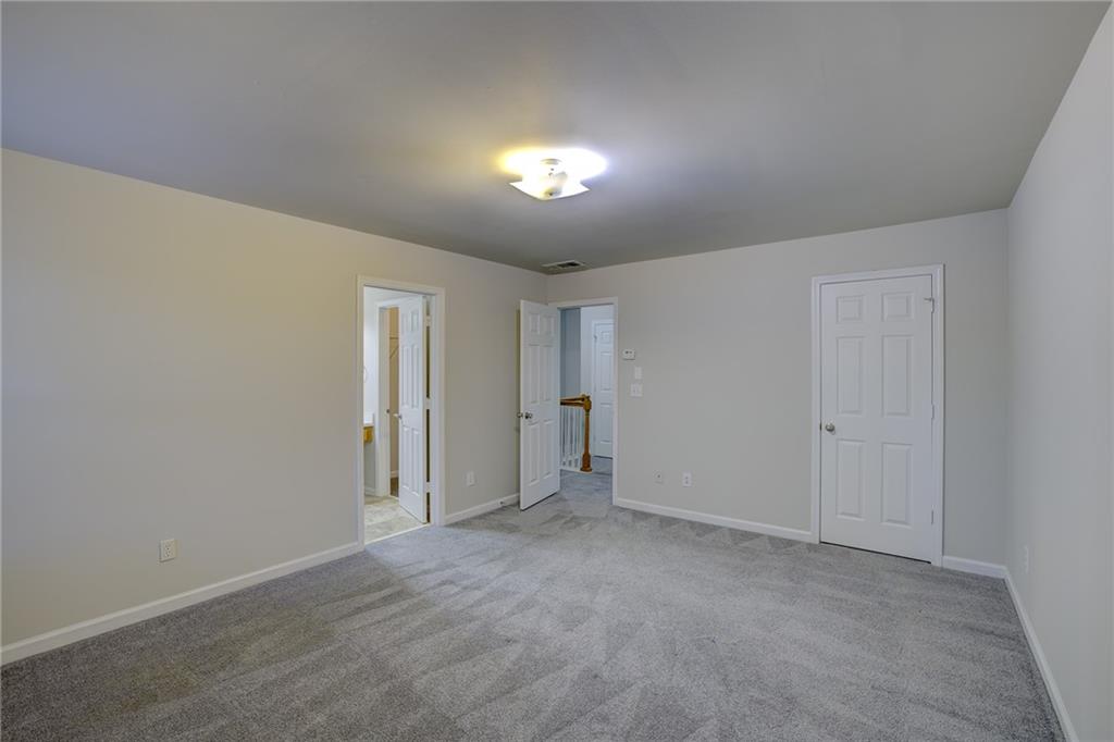 2161 Meadow Peak Road Duluth, GA 30097 - Photo 16 of 25 a view of an empty room and a window