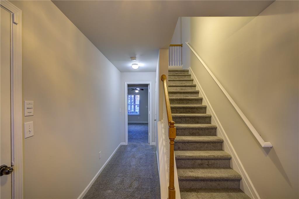 2161 Meadow Peak Road Duluth, GA 30097 - Photo 2 of 25 a view of entryway and hall with wooden floor