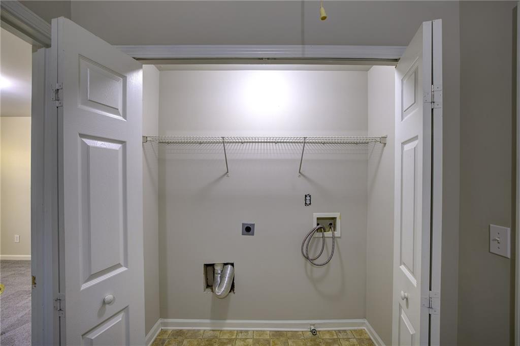 2161 Meadow Peak Road Duluth, GA 30097 - Photo 21 of 25 a bathroom with a glass shower door